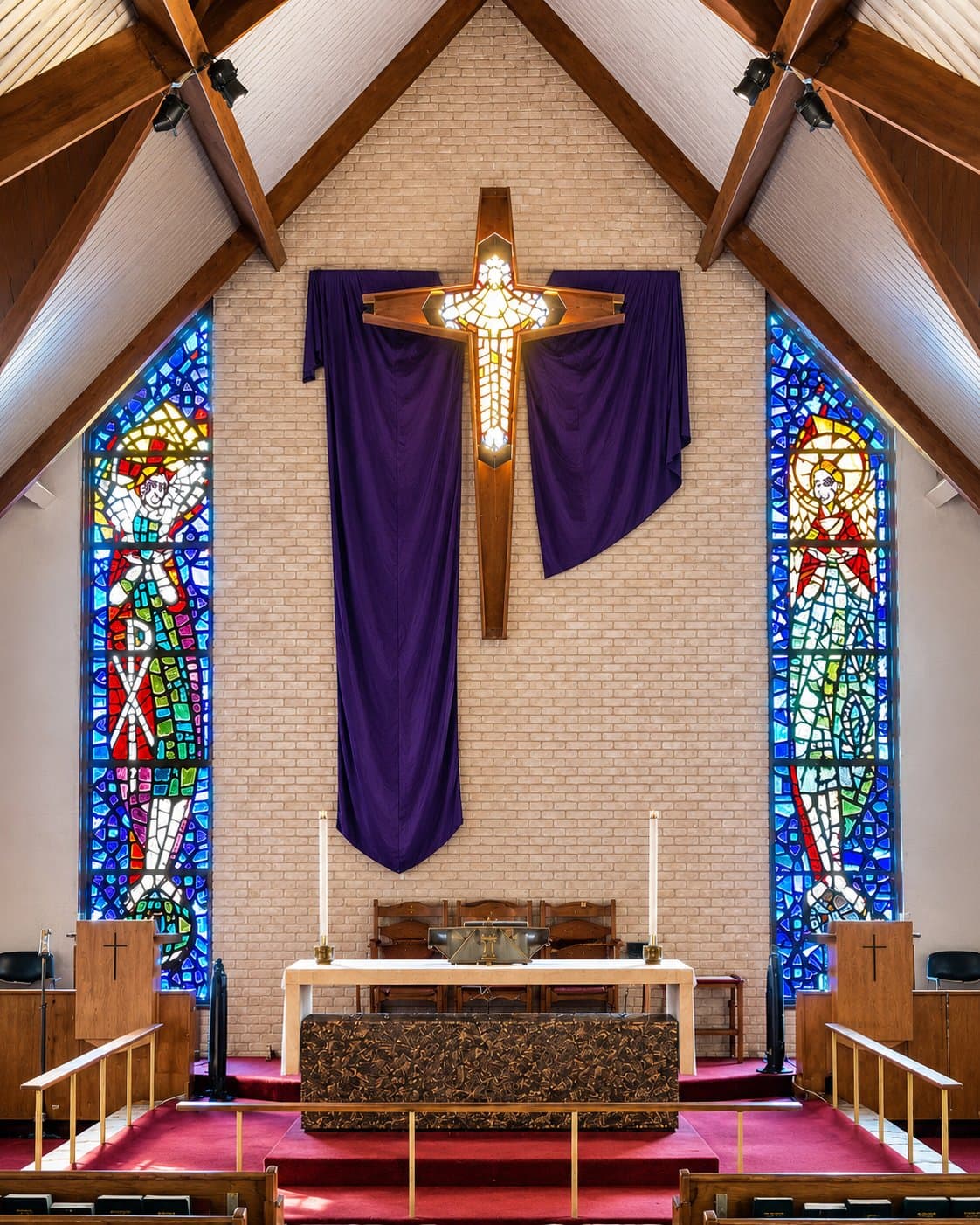 Good Shepherd sanctuary — altar, cross, and stained glass